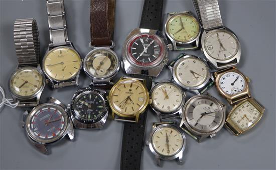 A small group of assorted gentlemans wrist watches including Garrard, Roamer and Tissot.